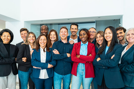 Group of multigenerational business team standing in front of camera during meeting work - Businesspeople with diverse age and ethnicity concept
