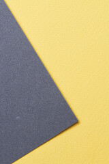 Fototapeta premium Rough kraft paper background, paper texture blue yellow colors. Mockup with copy space for text