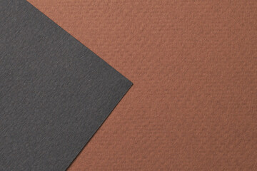 Rough kraft paper background, paper texture black brown colors. Mockup with copy space for text