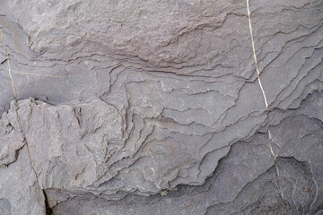 Natural drawings on stone near river in Carpathian Mountains, Ukraine