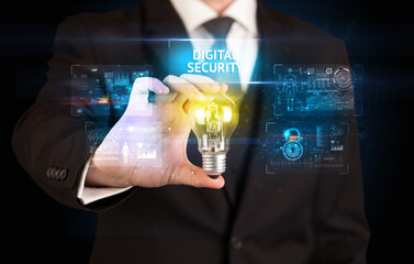 Businessman holding a light bulb, online security concept