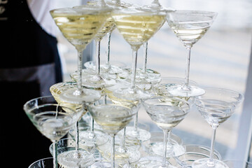 a pyramid of glasses for the party