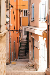 Historic city postcard view - beautiful narrow street of medieval Rovinj Croatia
