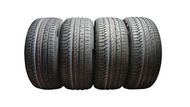 Car tires with a great profile in the car repair shop. Set of summer tyres in front of white fond. On transparent PNG background.