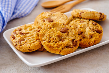 Chocolate chip cookies on white plate
