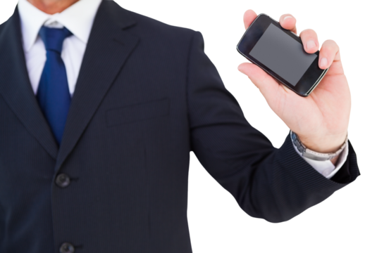 Mid section of a businessman typing on his phone