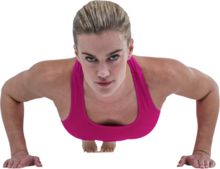 Portrait of pretty woman doing push ups 