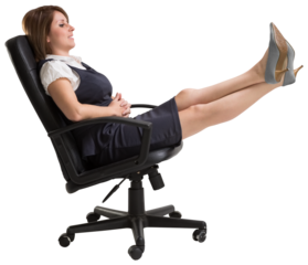 Side view of businesswoman relaxing on swivel chair