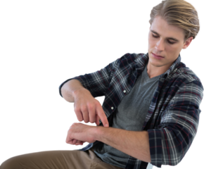 Young businessman looking at imaginary wristwatch
