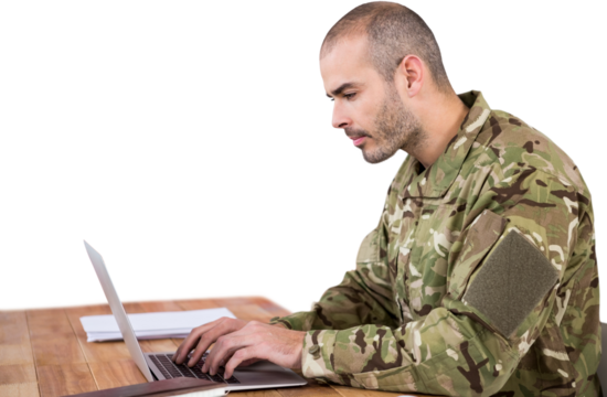 Confident military solider working on laptop at desk - Powered by Adobe