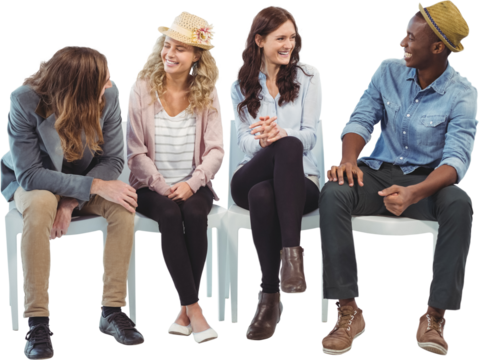 Smiling business people sitting on chair - Powered by Adobe