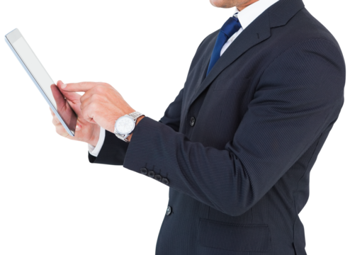 Businessman in suit using digital tablet