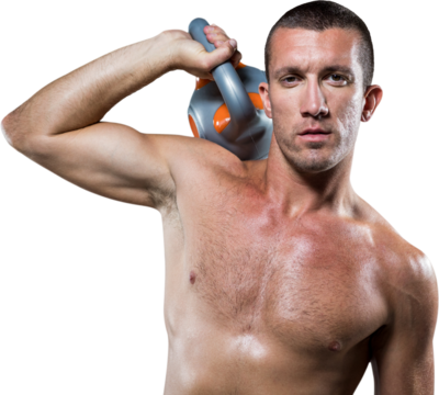 Confident male crossfitter holding kettlebell