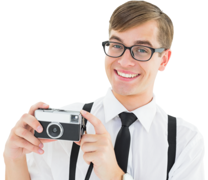 Geeky hipster holding a retro camera