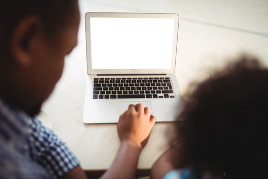 Father and daughter using laptop - Powered by Adobe