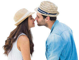 Happy hipster couple about to kiss