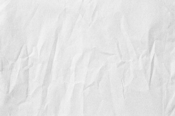 Fototapeta na wymiar Macro white crumpled paper texture surface