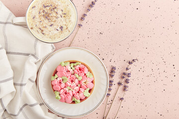 Summertime aesthetic lavender raf coffee with flowers and floral dessert, copy space