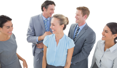 Happy business team smiling at each other 