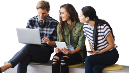 Business people discussing over laptop while sitting on seat