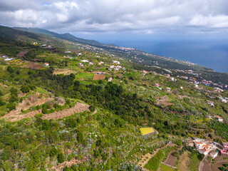 Fototapeta na wymiar Aerial View at Green Volcanic Hills near Los Sauces at La Palma Island, Canary Islands, Spain. 