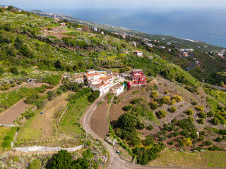 Fototapeta na wymiar Aerial View at Green Volcanic Hills near Los Sauces at La Palma Island, Canary Islands, Spain. 