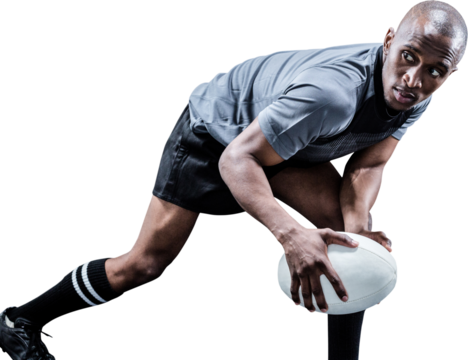 Determined sportsman looking away while playing rugby