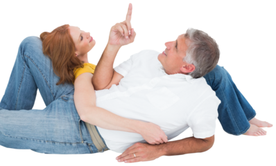 Casual couple lying on floor