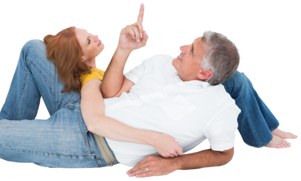 Casual couple lying on floor