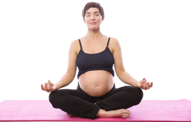 Pregnent woman sitting on mat in lotus pose over white background