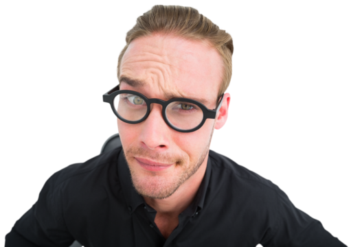 Doubtful businessman with glasses posing