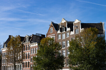 Fototapeta na wymiar Row of Beautiful Old Historic Buildings in the Amsterdam Centrum District