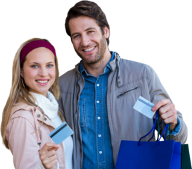 Smiling couple with shopping bags showing credit card