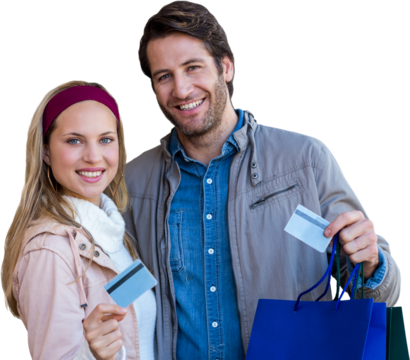 Smiling couple with shopping bags showing credit card - Powered by Adobe