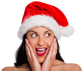 Surprised woman wearing santa hat