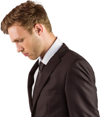 Young handsome businessman looking down