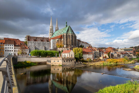 Gorlitz, Germany. Wide angle view on Neisse river Peterskirche church