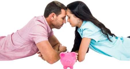 Couple laying on the floor face to face with piggybank