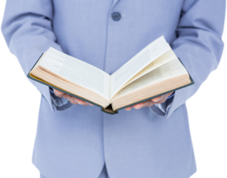 Midsection of businessman holding open book