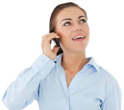 Smiling businesswoman looking upwards while on her phone