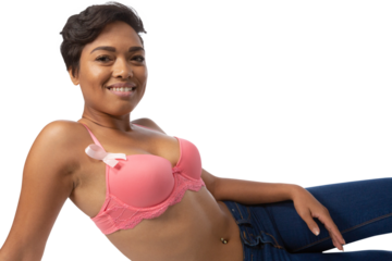 Woman for breast cancer awareness with ribbon against white background