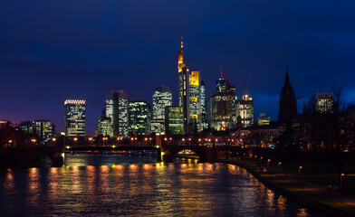 Frankfurt am Main, Germany, city skyline during blue hour.