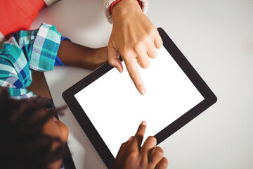 Teacher and student using digital computer