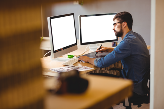 Graphic designer using graphics tablet
