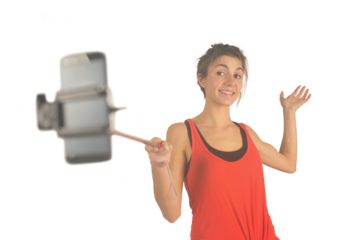 Casual brunette using selfie stick