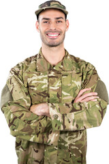 Portrait of smiling soldier standing with arms crossed