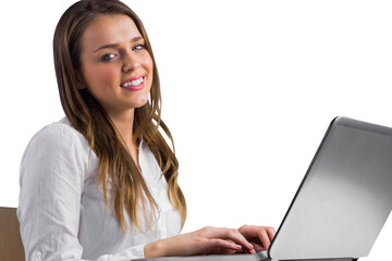 Businesswoman typing on her laptop