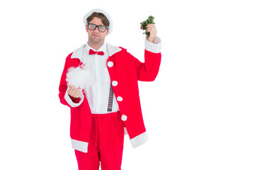 Geeky hipster in santa costume beard and mistletoe 