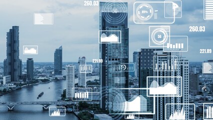 Business data analytic interface fly over smart city showing alteration future of business intelligence. Computer software and artificial intelligence are used to analyze big data for strategic plan .
