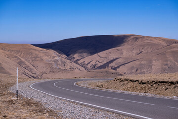The road on the background of beautiful mountains